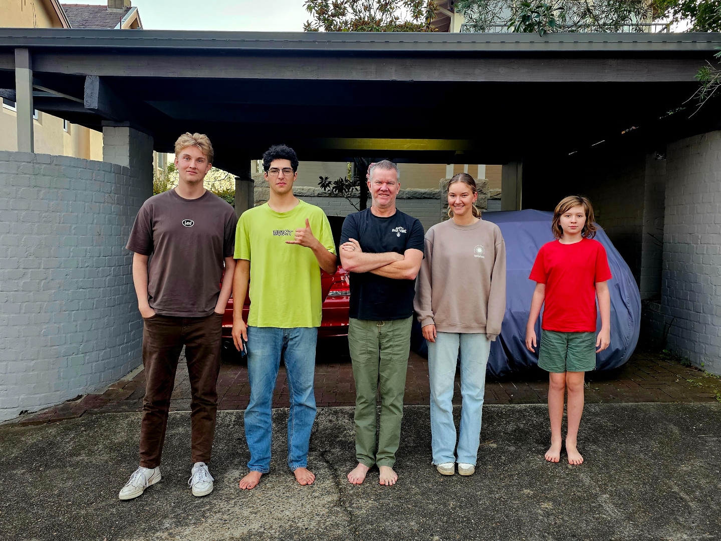 Craig Swanger with his four children, posed together